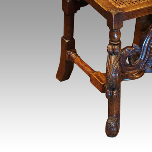 Pair Carolean style oak chairs front leg