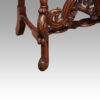 Pair Carolean style oak chairs front leg detail