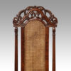 Pair Carolean style oak chairs top rail