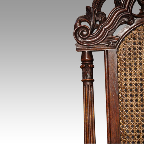 Pair Carolean style oak chairs upright