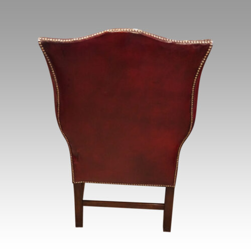 Pair of George VI leather wing chairs chair rear