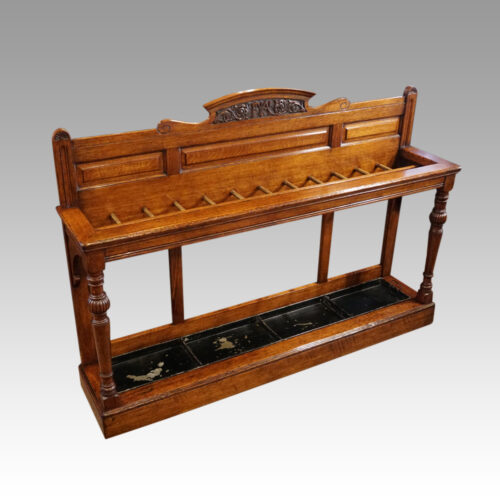 Victorian oak country house stick stand at angle