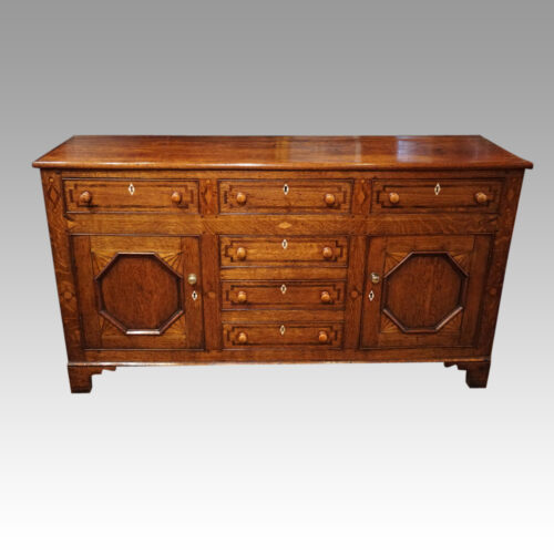 Antique oak inlaid dresser base front view