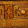 Antique oak inlaid dresser base inlay detail