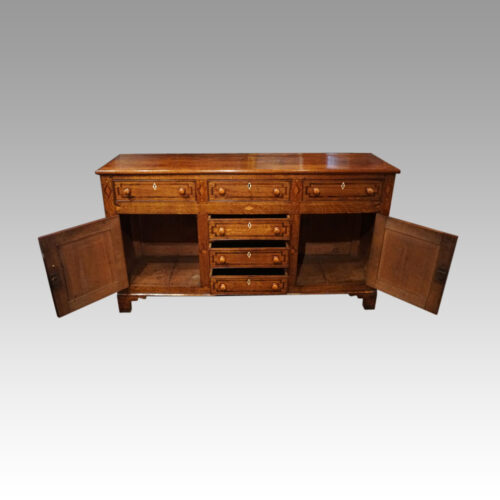 Antique oak inlaid dresser base interior