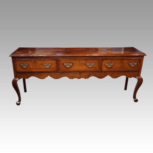 George III oak cabriole leg dresser front