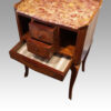 Pair of French bedside cabinets drawers open