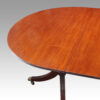 Regency style twin pillar dining table round end