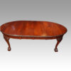 Edwardian oval extending dining table open with leaves