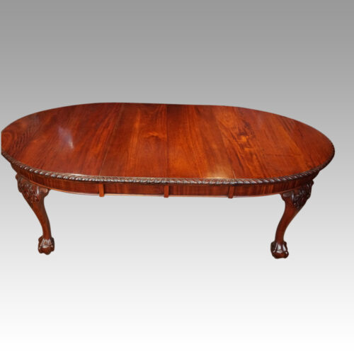 Edwardian oval extending dining table open with leaves