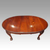 Edwardian oval extending dining table with one leaf