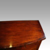 George III mahogany bow sideboard top end