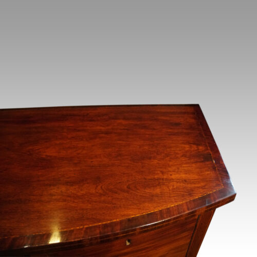 George III mahogany bow sideboard top end