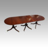 George III mahogany triple pillar dining table
