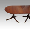 George III mahogany triple pillar dining table top end