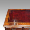 George V mahogany pedestal desk edge