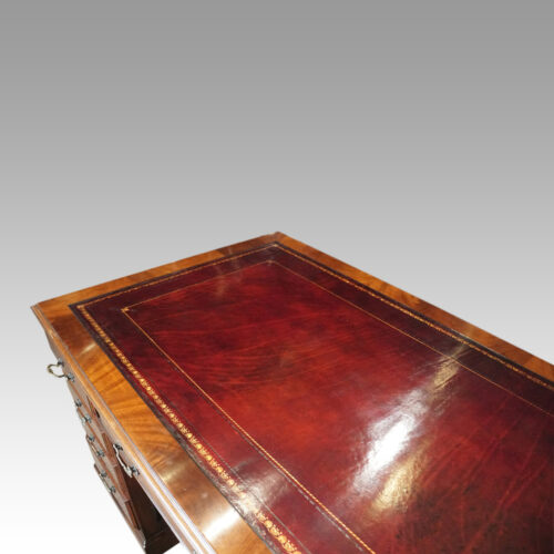 George V mahogany pedestal desk leather detail