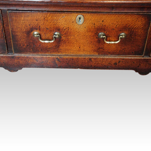 Georgian oak long dresser base middle drawer