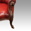 Victorian leather button back chair arm detail