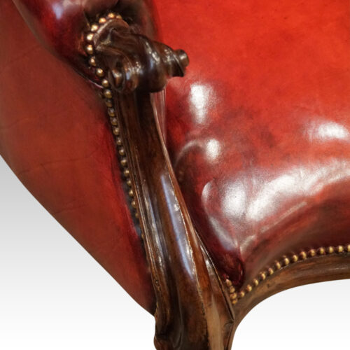 Victorian red leather reading chair hand grip