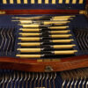 Edwardian mahogany canteen of cutlery handles