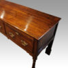 George III oak dresser base corner detail