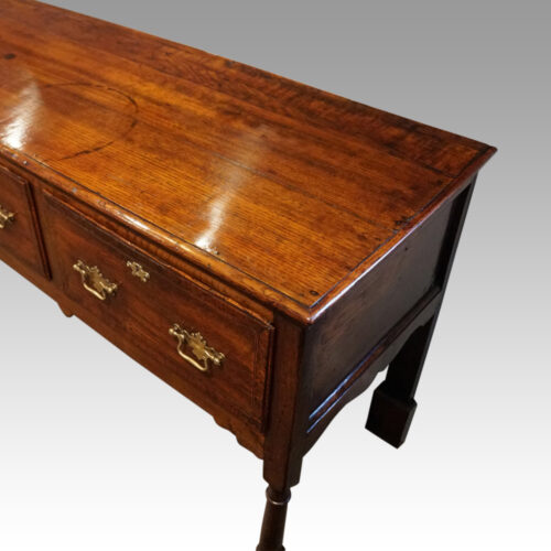 George III oak dresser base corner detail