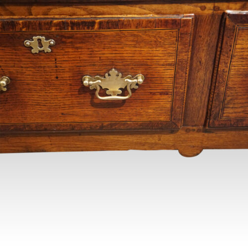 George III oak dresser base drawer detail