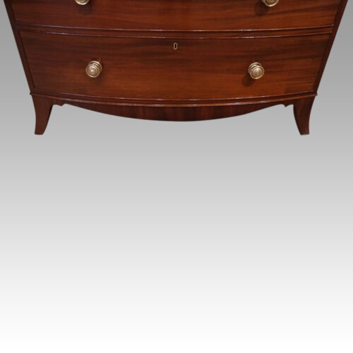 Pair of Georgian bow chests of drawers apron top
