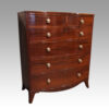 Pair of Georgian bow chests of drawers at angle