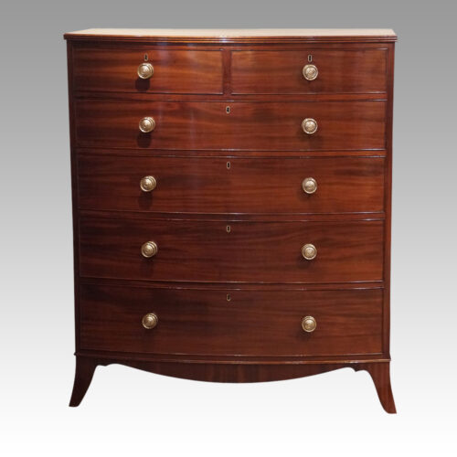 Pair of Georgian bow chests of drawers front