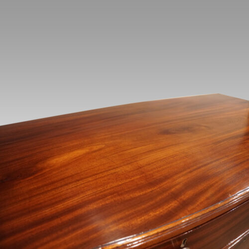 Pair of Georgian bow chests of drawers top detail