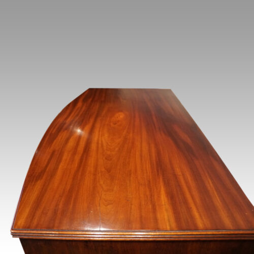 Pair of Georgian bow chests of drawers top end view