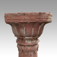 Antique red stone carved column top