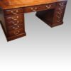 Edwardian mahogany large pedestal desk at angle