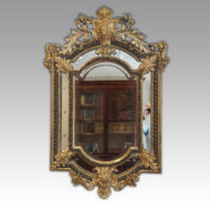 Large gilt cushion mirror