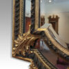 Large gilt cushion mirror acanthus