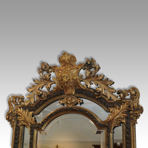 Large gilt cushion mirror cresting
