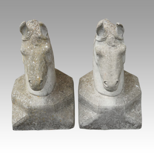 Pair of horsehead column tops