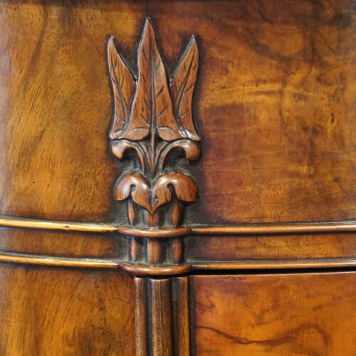 Victorian walnut oval cupboard carving detail