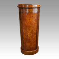 Victorian walnut oval cupboard front
