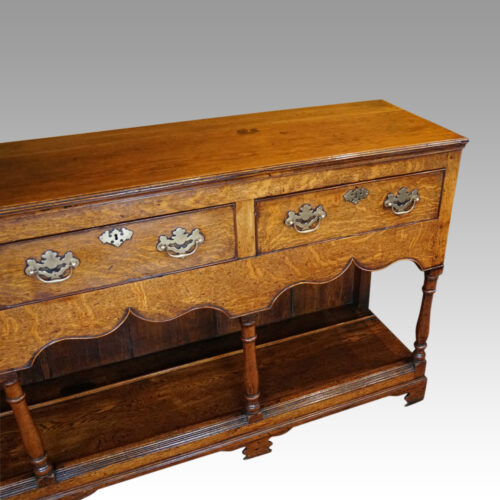 Georgian oak potboard dresser base angle front