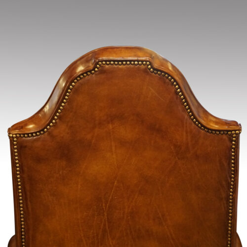 Antique walnut high back leather wingback chair back detail