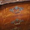 Continental marquetry bombe commode front detail