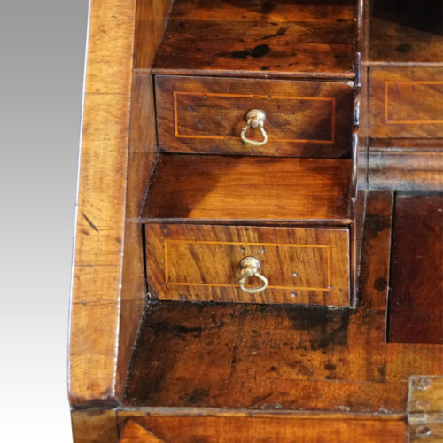 George I walnut bureau stepped interior