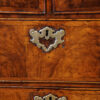 George I walnut chest of drawers escutcheon