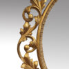 Gilt oval mirror carved edge
