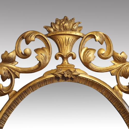 Gilt oval mirror crest