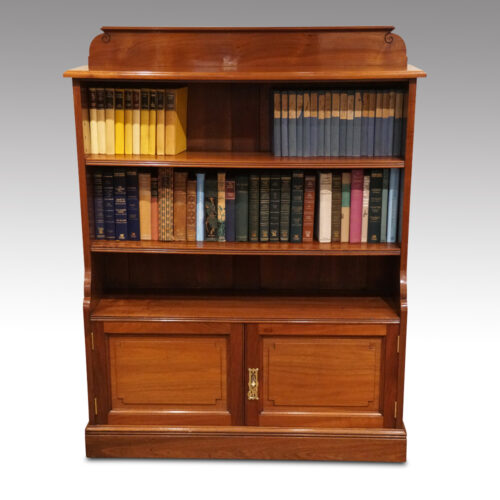 Pair of Edwardian walnut open bookcases front
