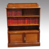 Pair of Edwardian walnut open bookcases front front detail